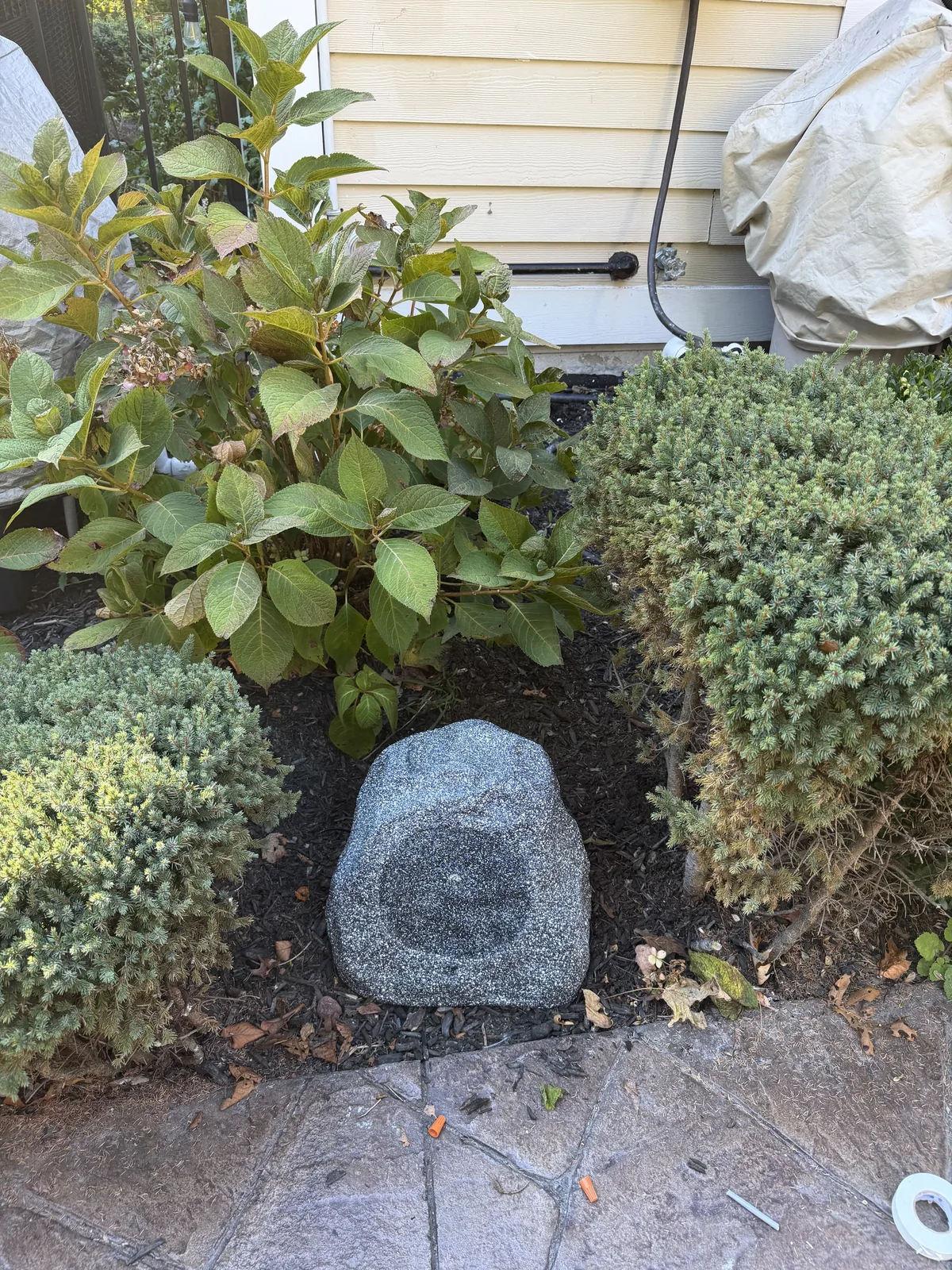 Landscape speaker in a garden